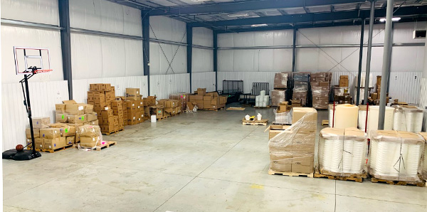Boxes in a warehouse - along with a basketball hoop
