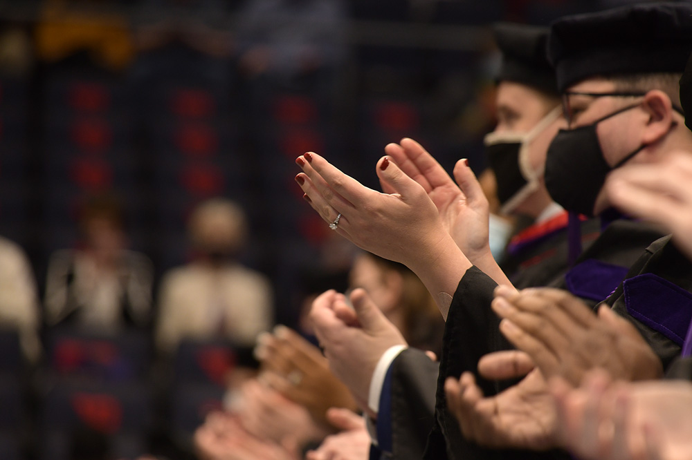 Graduates clap