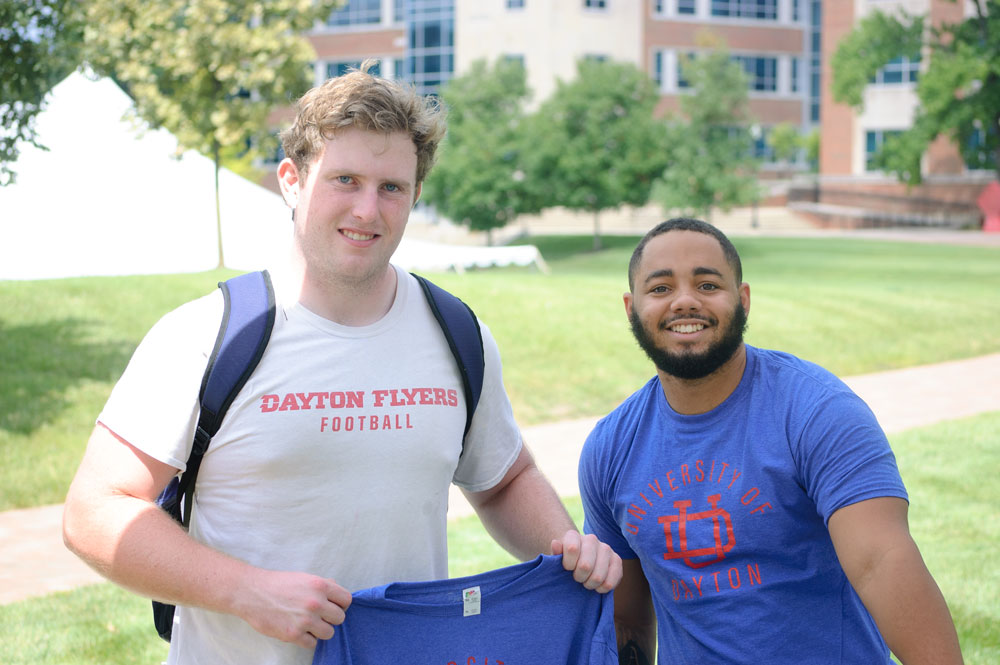 Two students in UD shirts