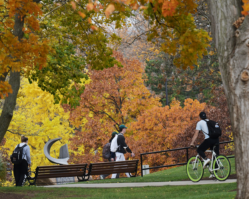 Students walk to class on a fall day
