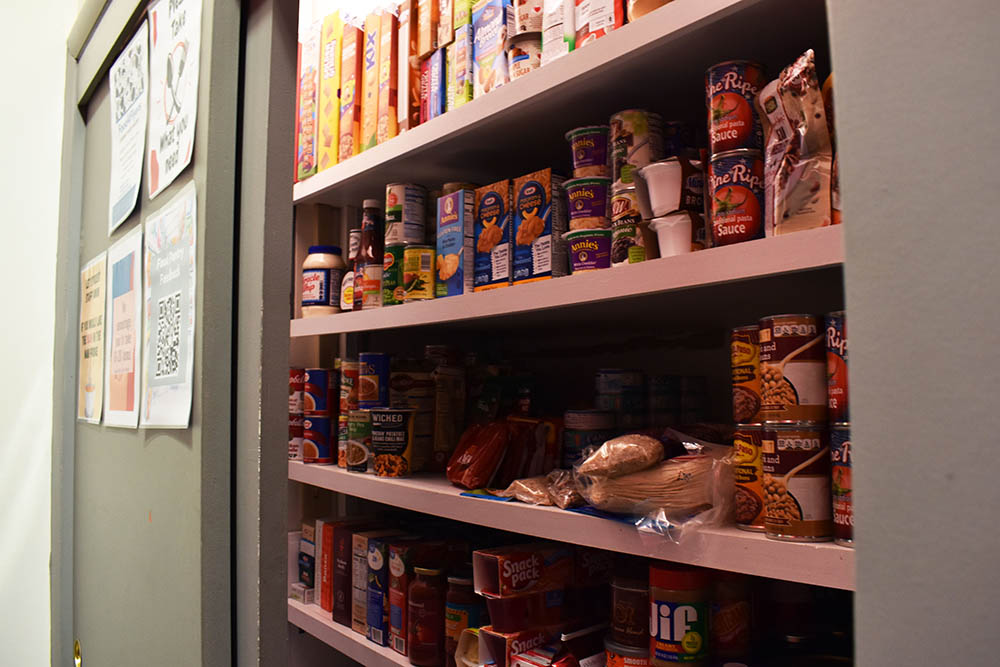 Different food on the shelves of the Food4Flyers Food Pantry.