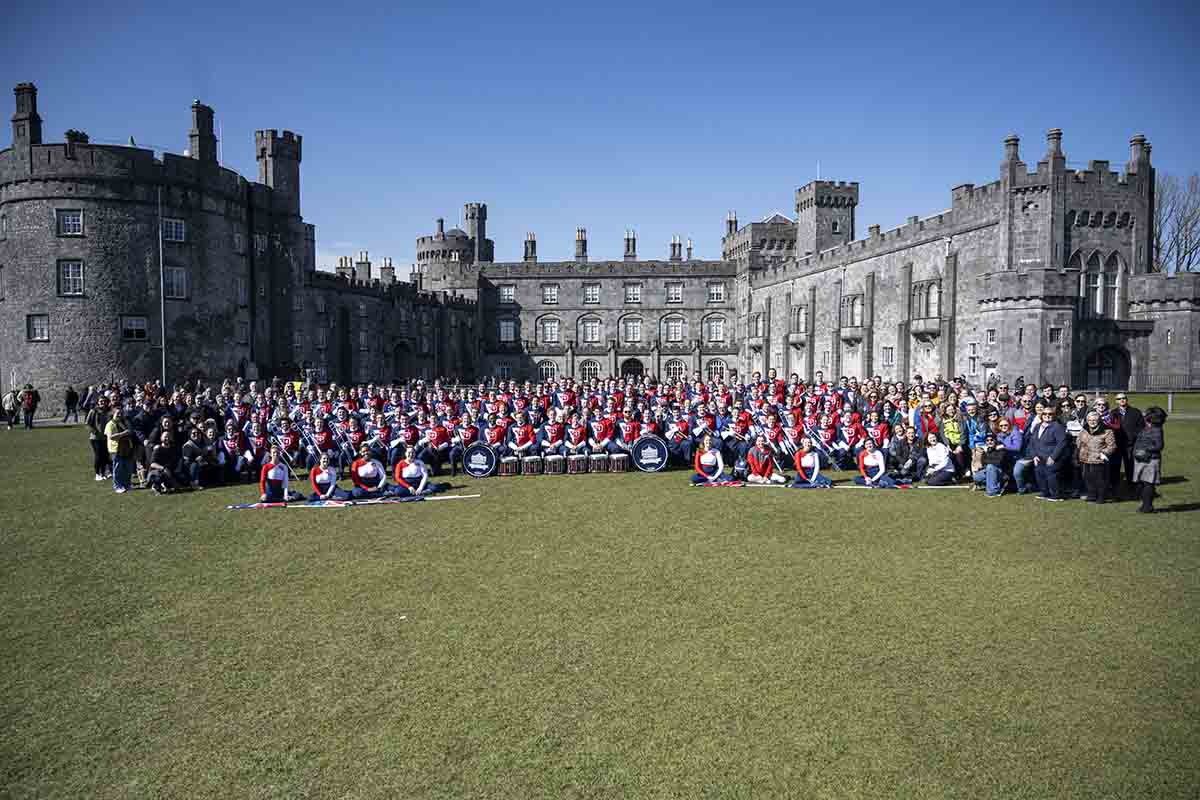 Pride of Dayton pose for group photo in front of Kilkenny Castle.