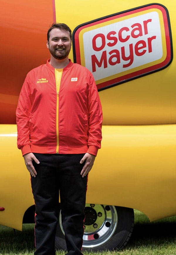 Ben stands in front of the Oscar Mayer Wienermobile