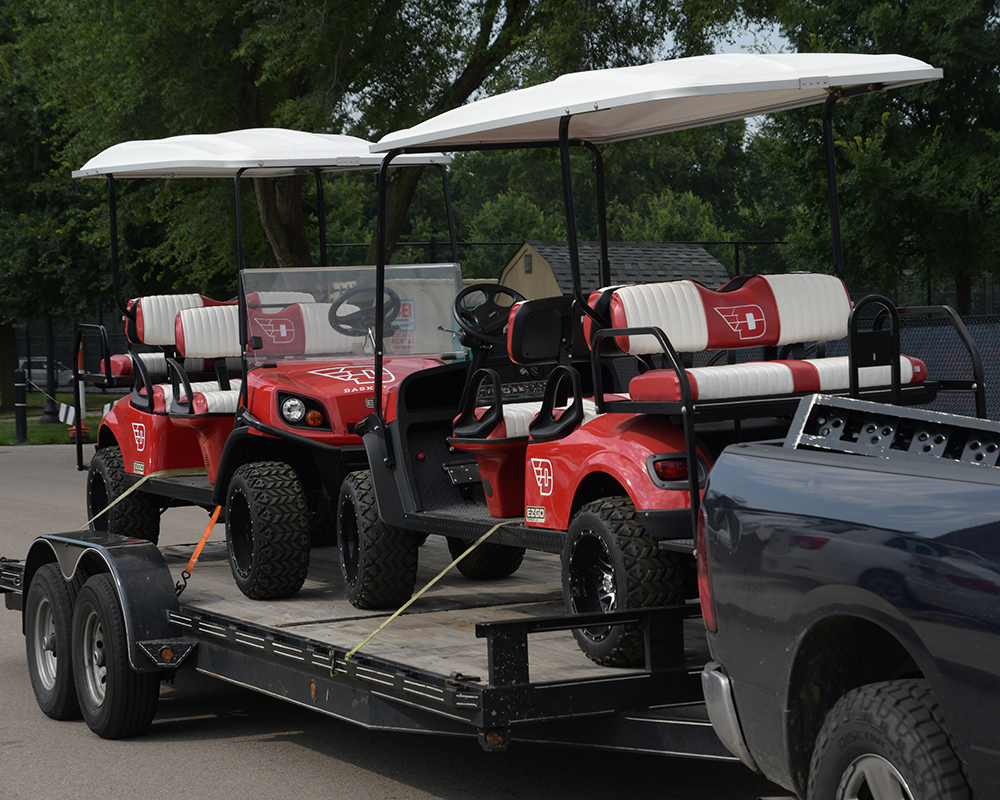 Golf carts on a trailer