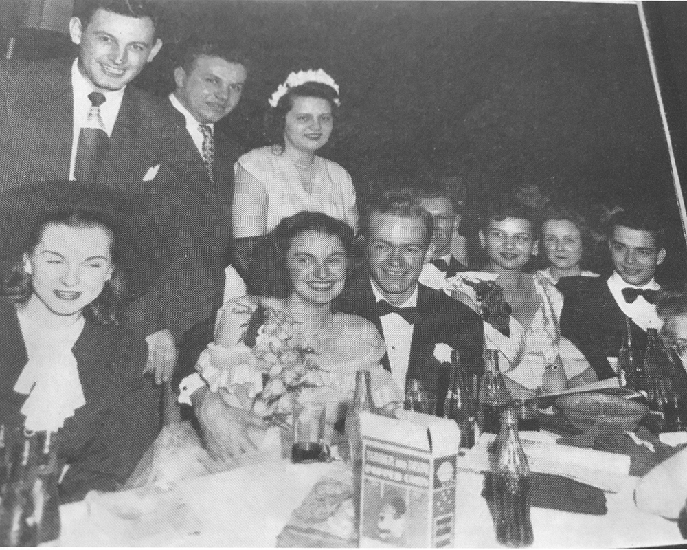 Al and Patti Suttmann with loved ones on their wedding day.