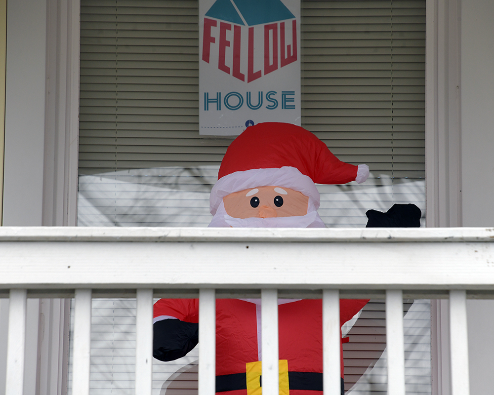 An inflatable Santa on a porch