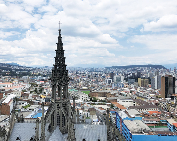 The view of the city of Quito's rooftops.