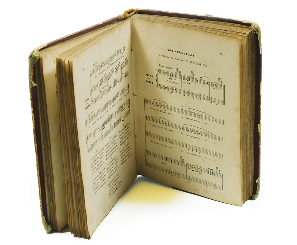 Photo by of a large book of hymns.