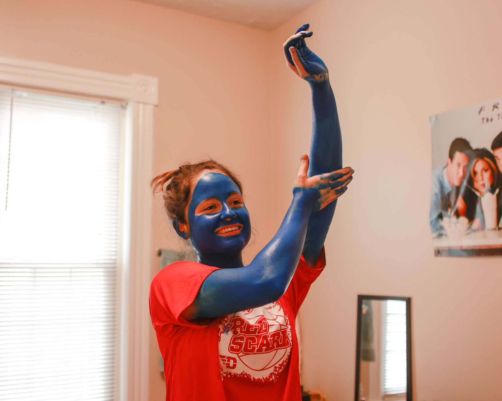 A Red Scare member paints up before the game