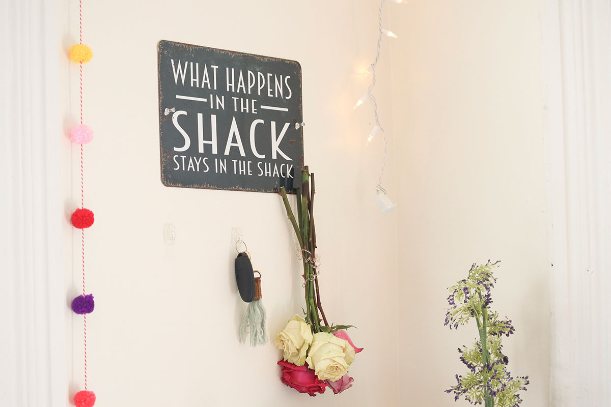 A sign that reads "What happens in the Shack, stays in the Shack."