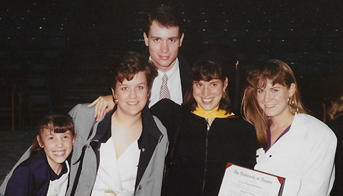 Elaine Ruthermeyer Little ’90 (center right) at her graduation with her brother Bernie Ruthermeyer ’87 (center) and her sister Martha Ruthermeyer ’03 (far left).