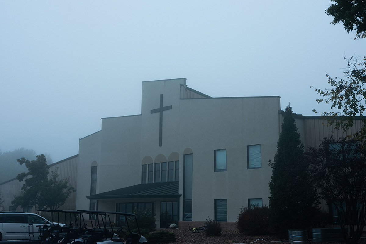 a image of a conference building in Marano, OH on a misty morning  