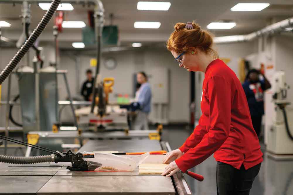 Amanda Duritsch uses the table saw in UD’s Makerspace Lab