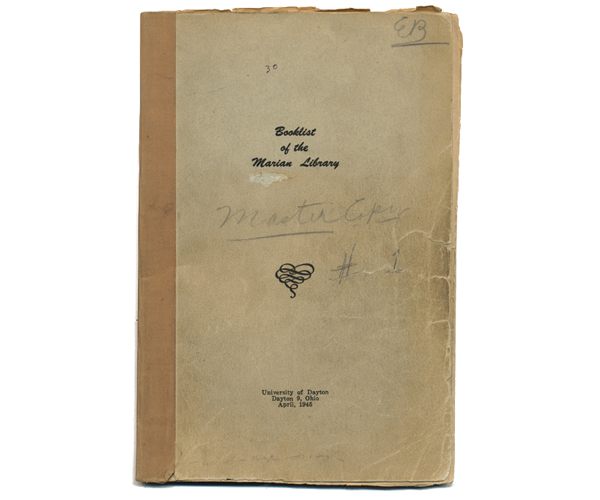 bound booklist with tattered edges and "Booklist of the Marian Library" printed in a script font on the cover