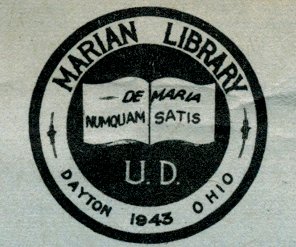 circular seal consists of "Marian Library" set on a curve around the top; Dayton 1943 Ohio curved at the bottom; an open book with "