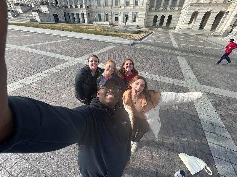 Selfie of CSMG students in front of the Capitol