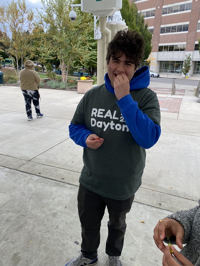 Student with REAL Dayton t-shirt 