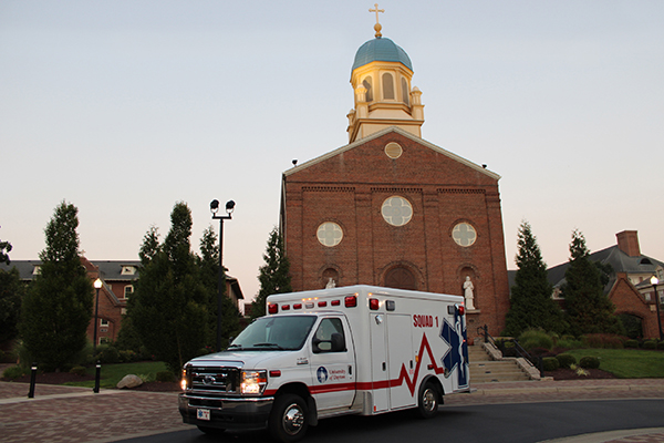 UD EMS ambulance in front of the chapel in the early evening.