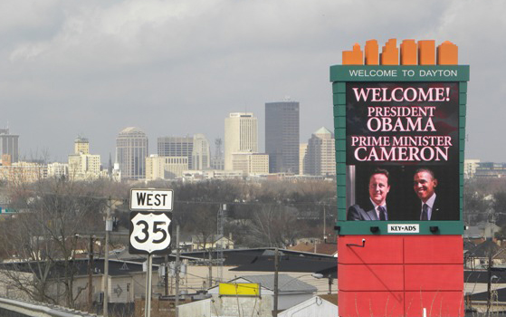 A sign on US 35 welcomes President Barack Obama and British Prime Minister David Cameron to Dayton for the First Four, March 13, 2012.