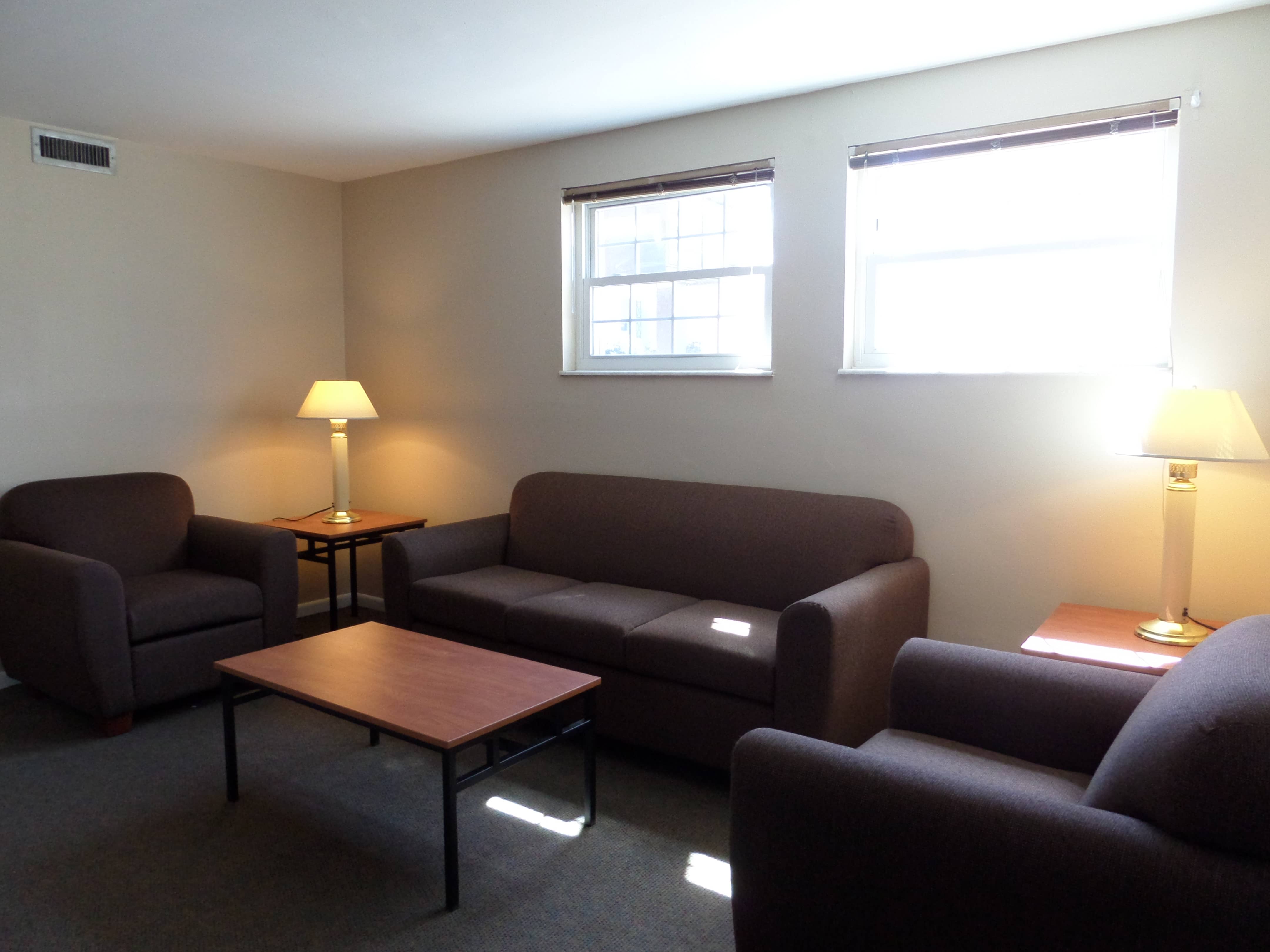 Shared lounge with comfortable couches and chairs