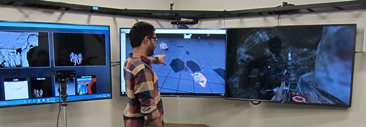 UDRI researcher working with virtual reality imagery