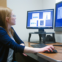 A researcher at UDRI works with NDE software