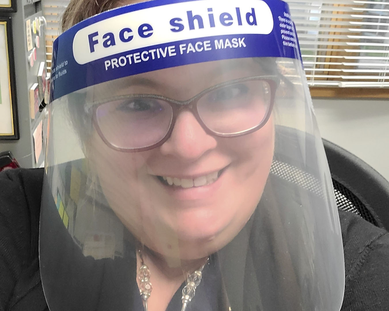 Teacher wearing a faceshield